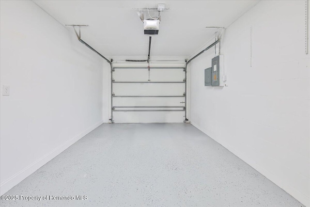 4016 Centavo Ct, Hernando Beach, FL 34607 - garage with a garage door opener and electric panel