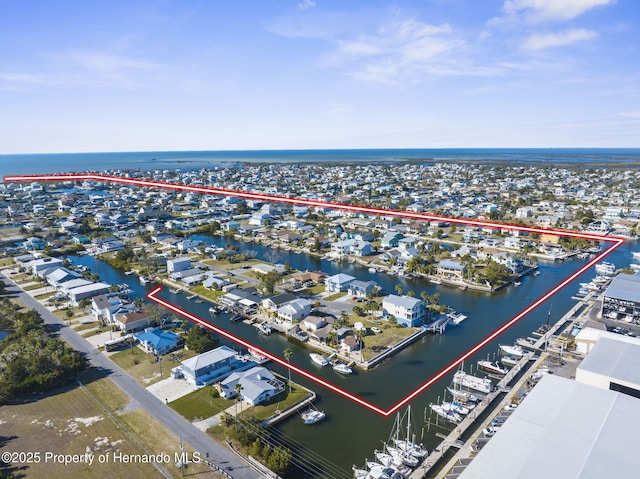 4016 Centavo Ct, Hernando Beach, FL 34607 - aerial perspective of suburban area with a large body of water