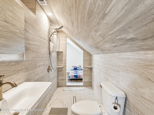 3579 Eagle Nest Dr, Hernando Beach, FL 34607 - bathroom with tile walls, lofted ceiling, wooden ceiling, and tile patterned floors