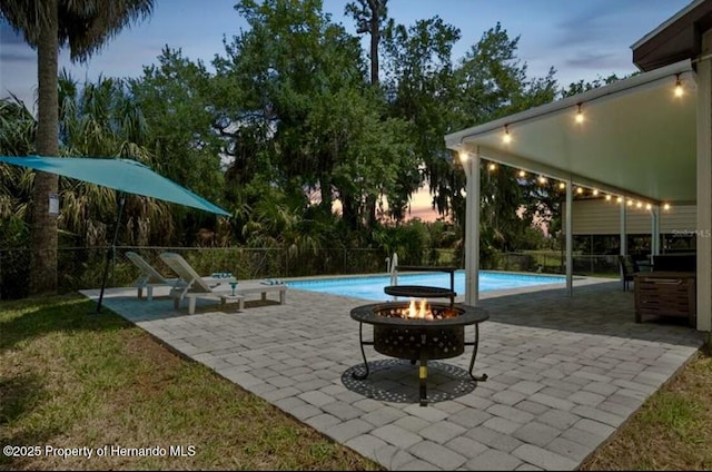 3579 Eagle Nest Dr, Hernando Beach, FL 34607 - view of swimming pool featuring a patio area and a fire pit