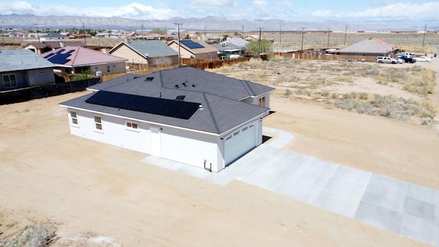 bird's eye view featuring a mountain view and a residential view