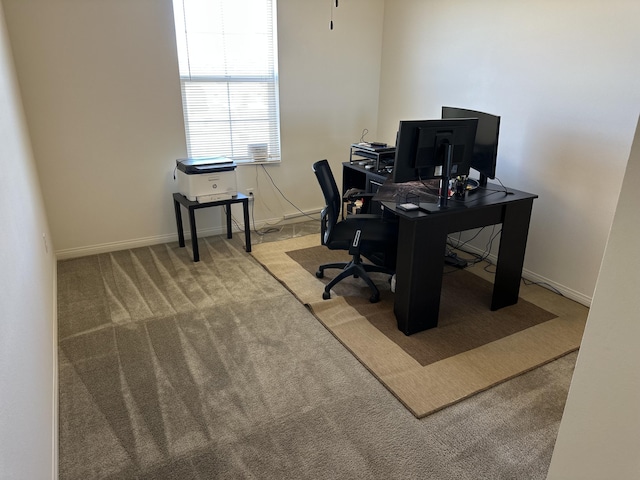 home office featuring baseboards and carpet floors