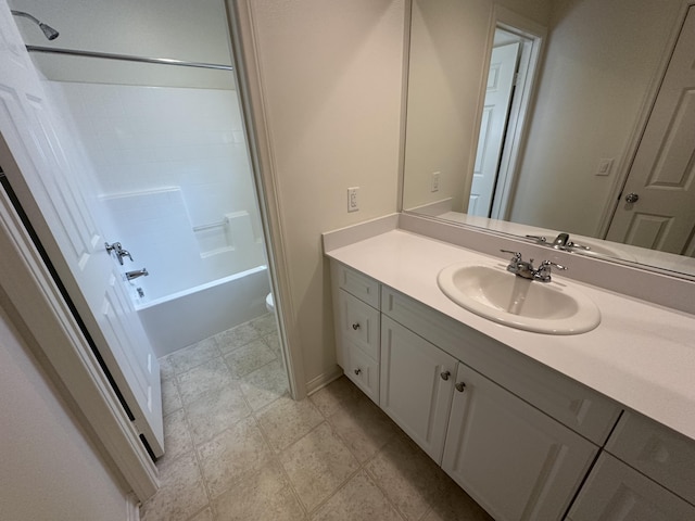 bathroom featuring toilet, bathtub / shower combination, and vanity