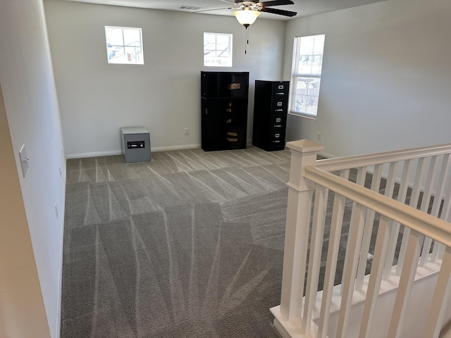 bedroom featuring baseboards, carpet, and a ceiling fan