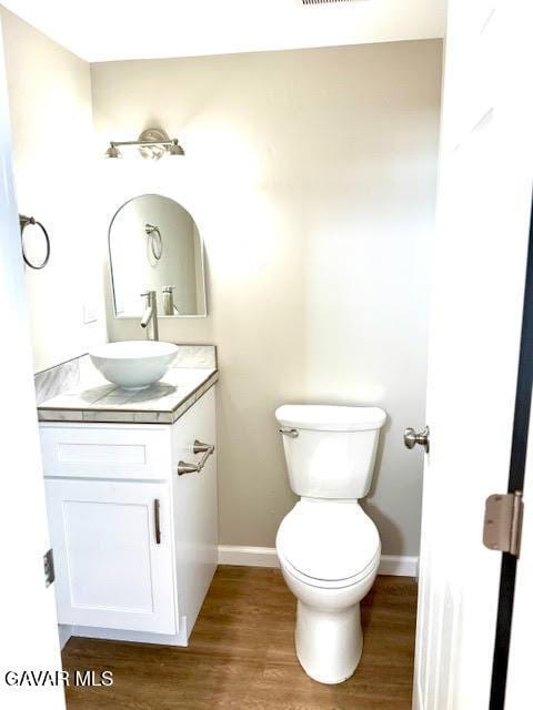 3503 Glenridge Ave, Rosamond, CA 93560 - bathroom with vanity and wood finished floors