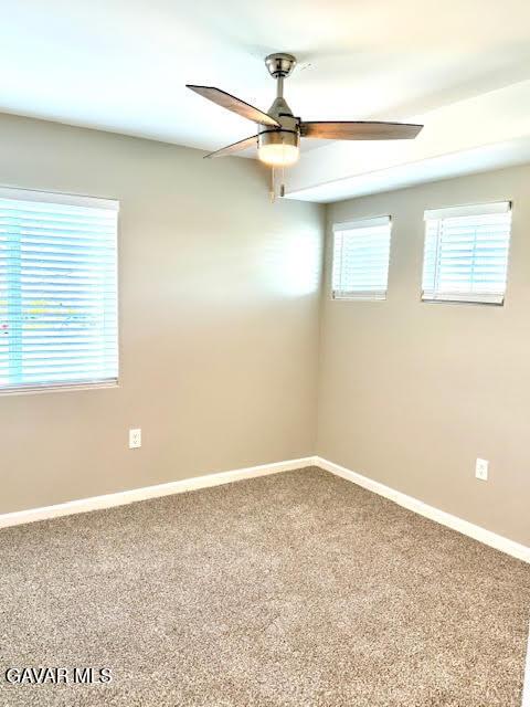 3503 Glenridge Ave, Rosamond, CA 93560 - carpeted spare room with ceiling fan and baseboards