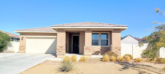 view of front of house with stone siding, fence, and stucco siding