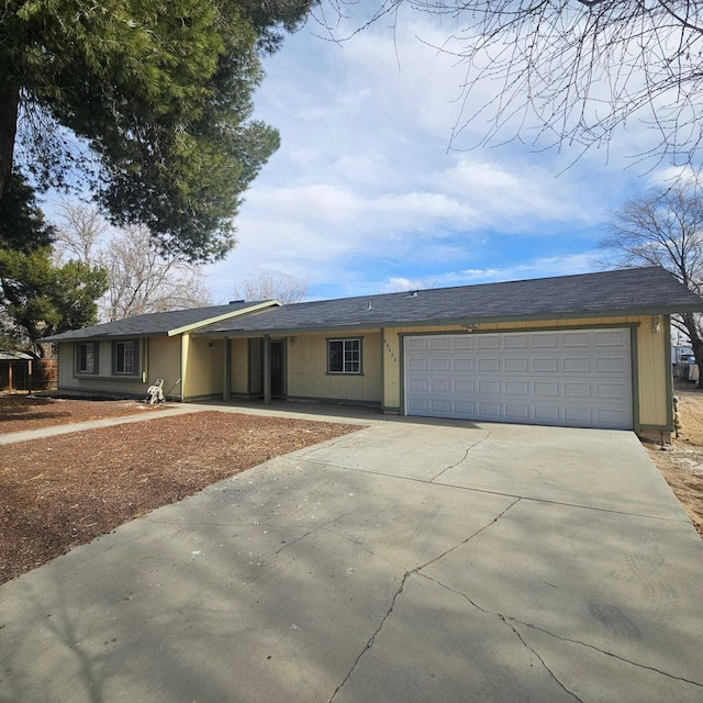 ranch-style home with a garage