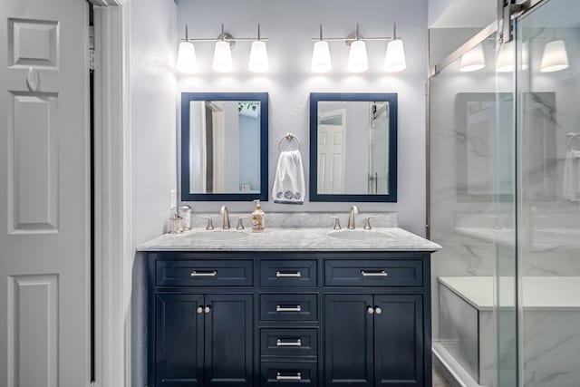 bathroom with vanity and walk in shower