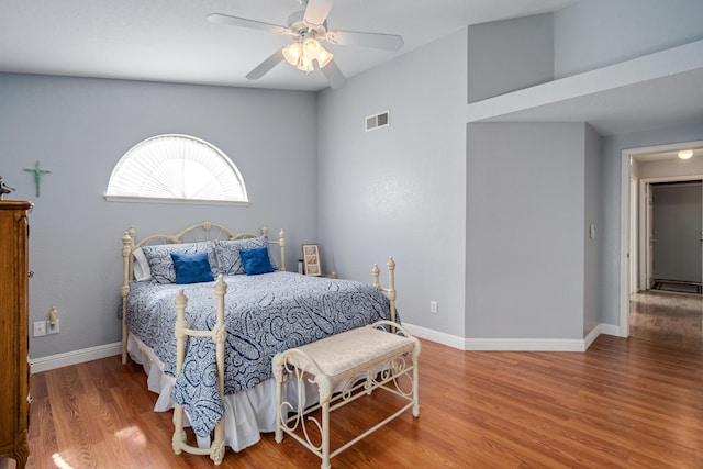 bedroom featuring hardwood / wood-style floors and ceiling fan