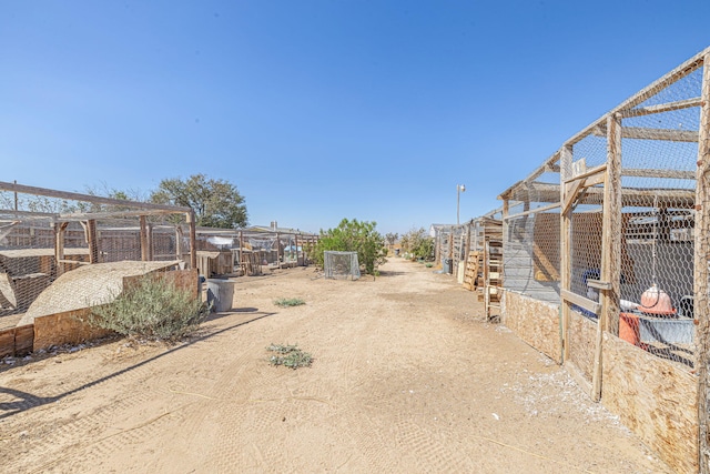 15035 E E Ave Unit G, Lancaster, CA 93535 - view of yard featuring an outdoor structure