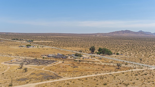 15035 E E Ave Unit G, Lancaster, CA 93535 - aerial view of sparsely populated area featuring a desert landscape and a mountain backdrop