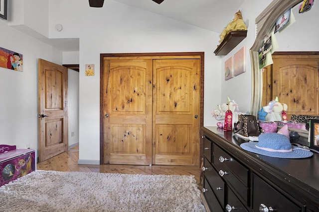 bedroom featuring vaulted ceiling, ceiling fan, and light hardwood / wood-style floors