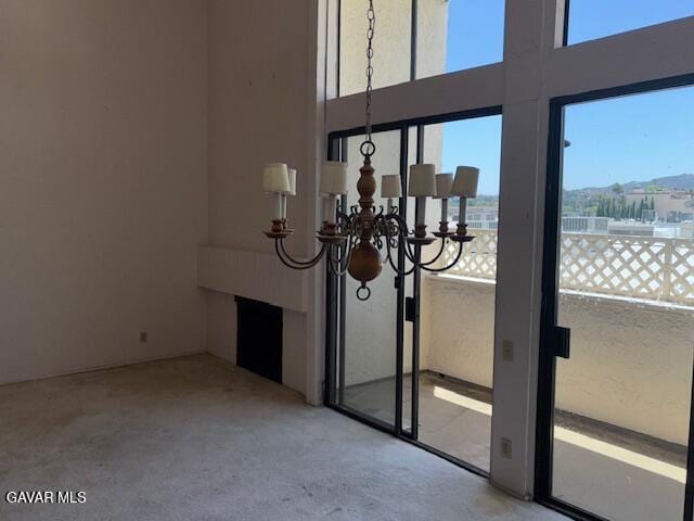 5310 Zelzah Ave Unit 305, Encino, CA 91316 - detailed view of a chandelier and carpet floors