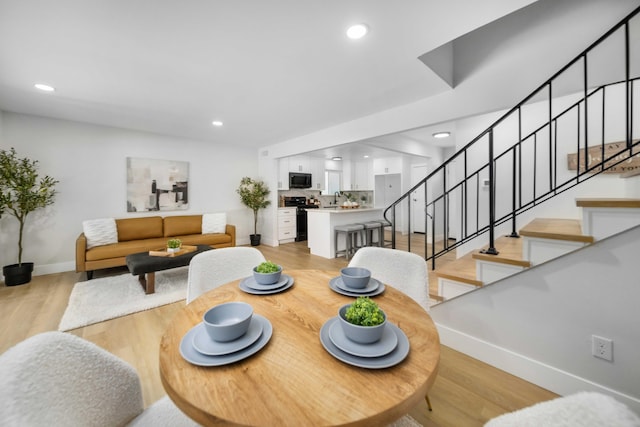 dining area featuring light hardwood / wood-style floors