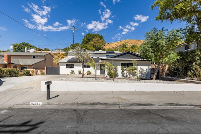 view of front of home featuring a mountain view