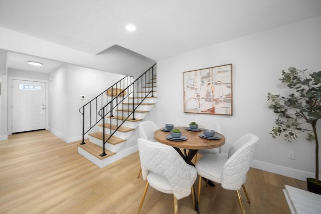 dining room with light wood-type flooring