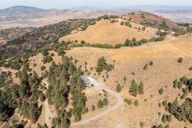 aerial view of property's location featuring mountains