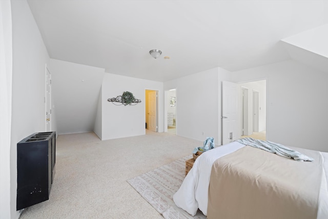 bedroom with light colored carpet