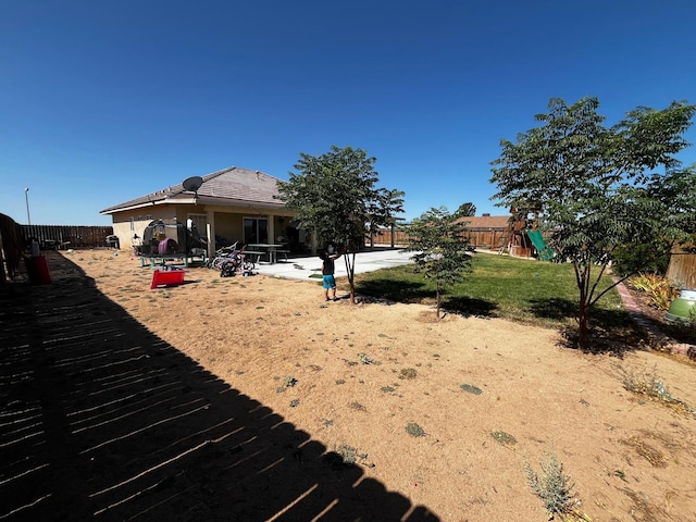 view of yard with a patio area