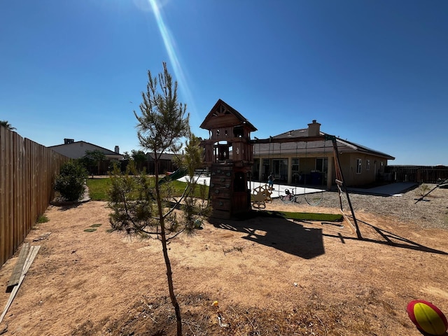 view of yard with a playground