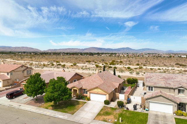 bird's eye view featuring a desert view and a mountain view
