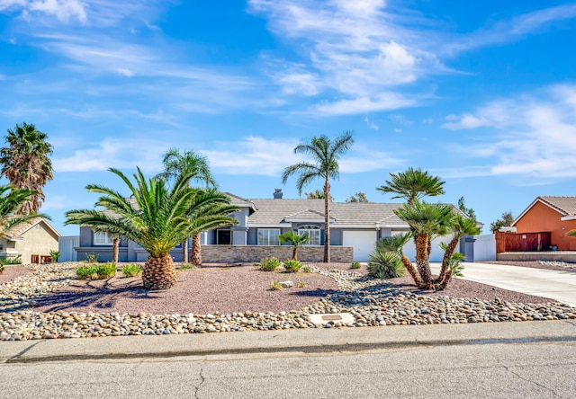 ranch-style home with a garage