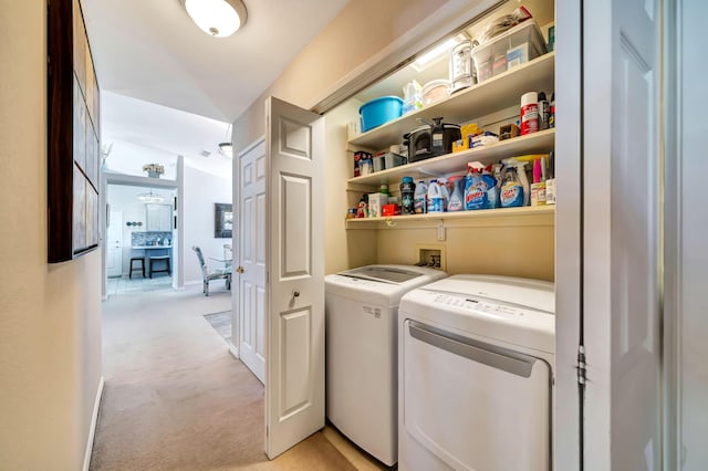 washroom with light colored carpet and independent washer and dryer