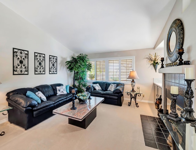 living room with carpet floors and vaulted ceiling