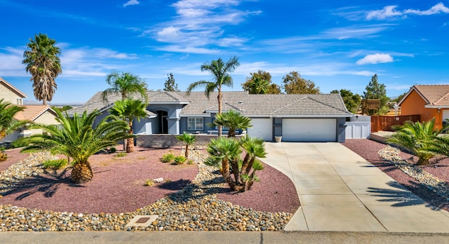 ranch-style house featuring a garage