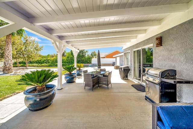 view of patio featuring a grill