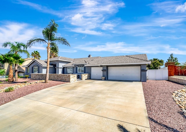 single story home with a garage