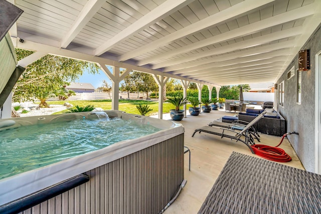 view of patio with a hot tub