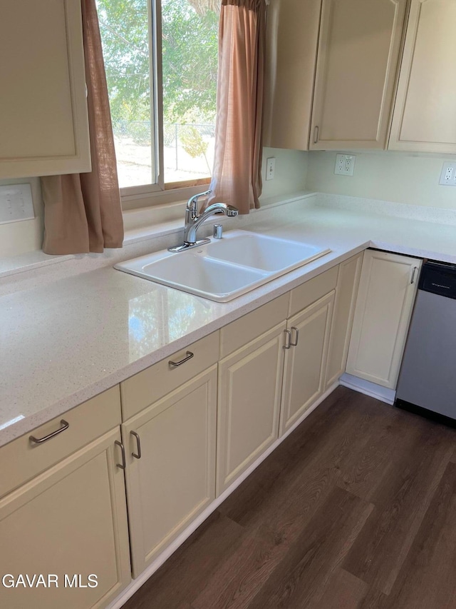 3358 Martin Ave, Mojave, CA 93501 - kitchen with dishwashing machine, light countertops, dark wood finished floors, and white cabinetry