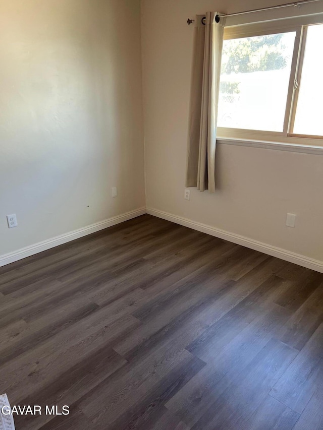 3358 Martin Ave, Mojave, CA 93501 - empty room with dark wood-style flooring