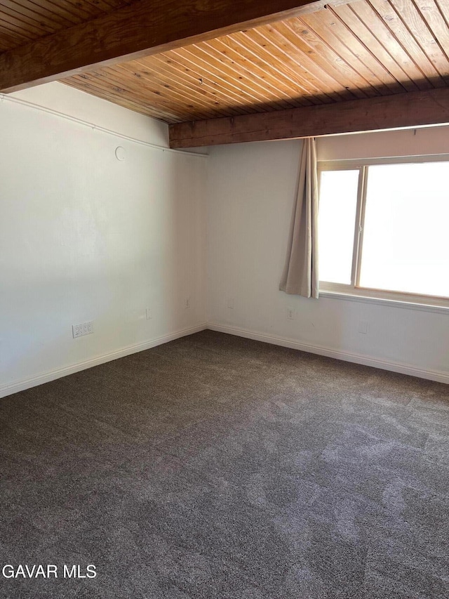 3358 Martin Ave, Mojave, CA 93501 - spare room with carpet flooring and a wooden ceiling with exposed beams