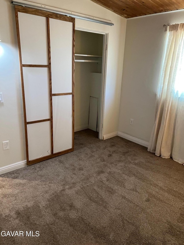 3358 Martin Ave, Mojave, CA 93501 - unfurnished bedroom featuring carpet, wood ceiling, and a closet