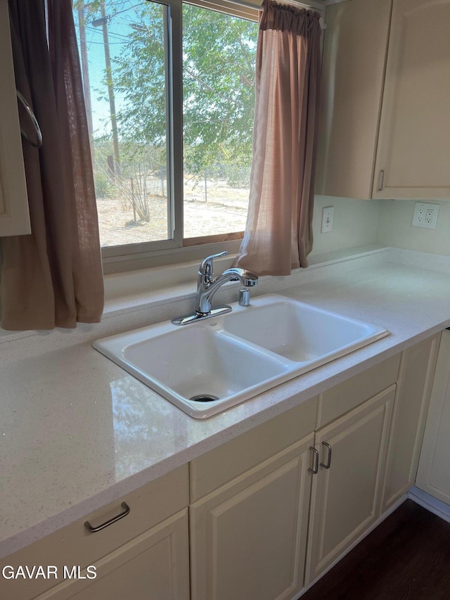 3358 Martin Ave, Mojave, CA 93501 - kitchen featuring plenty of natural light, light countertops, and white cabinets