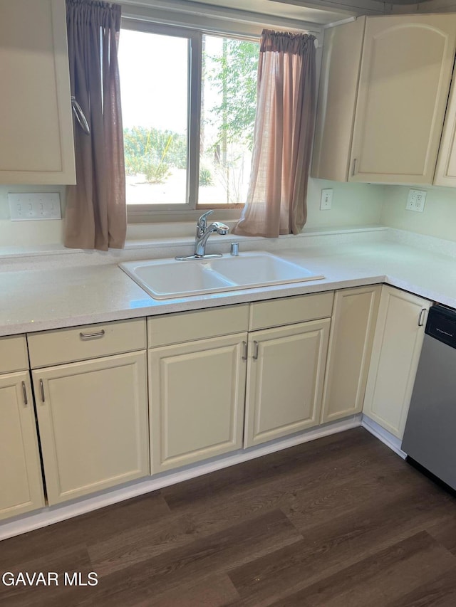 3358 Martin Ave, Mojave, CA 93501 - kitchen featuring dishwasher, light countertops, and white cabinets