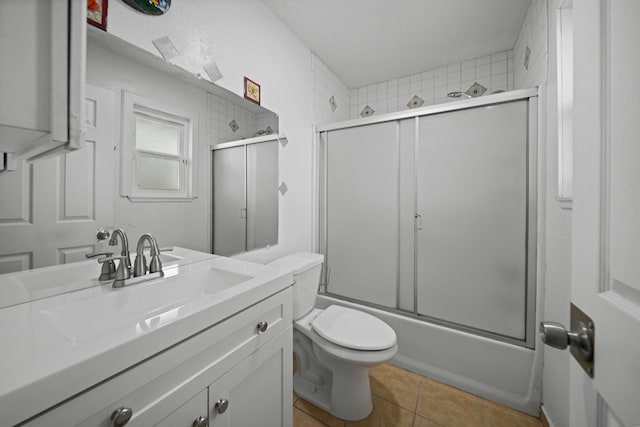 40103 E 169th St, Palmdale, CA 93591 - full bathroom with vanity, toilet, combined bath / shower with glass door, and tile patterned flooring