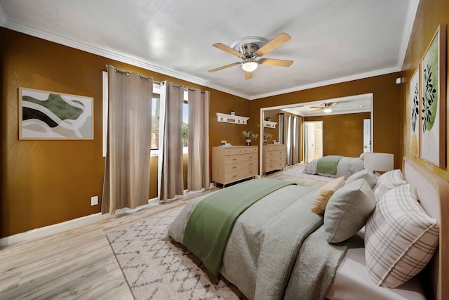 40103 E 169th St, Palmdale, CA 93591 - bedroom with baseboards, wood finished floors, crown molding, and ceiling fan
