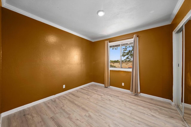 40103 E 169th St, Palmdale, CA 93591 - spare room with light wood-style floors, ornamental molding, and baseboards