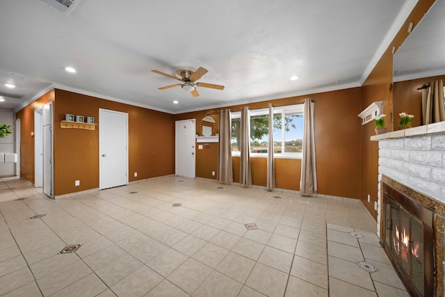 40103 E 169th St, Palmdale, CA 93591 - unfurnished living room with ceiling fan, a glass covered fireplace, crown molding, recessed lighting, and light tile patterned floors