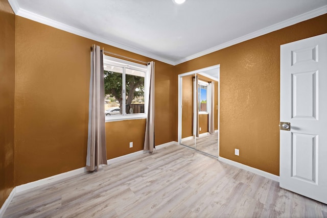40103 E 169th St, Palmdale, CA 93591 - unfurnished bedroom with ornamental molding, wood finished floors, a closet, and baseboards