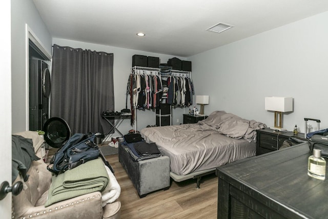 10615 San Fernando Rd, Pacoima, CA 91331 - bedroom with wood finished floors, a closet, and recessed lighting