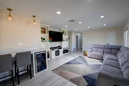 45522 Andale Ave, Lancaster, CA 93535 - living room with wood finished floors and recessed lighting