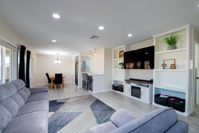 45522 Andale Ave, Lancaster, CA 93535 - living room with light wood-style floors, recessed lighting, and baseboards