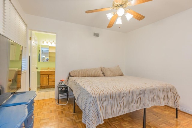 22437 Haynes St, West Hills, CA 91307 - bedroom with ensuite bathroom, visible vents, ceiling fan, and a sink
