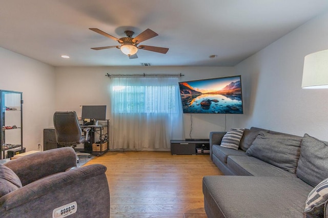 22437 Haynes St, West Hills, CA 91307 - living area featuring visible vents, ceiling fan, and wood finished floors