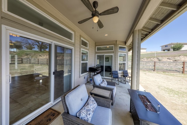 24500 Jacaranda Dr, Tehachapi, CA 93561 - view of patio featuring fence, a ceiling fan, area for grilling, and an outdoor living space with a fire pit